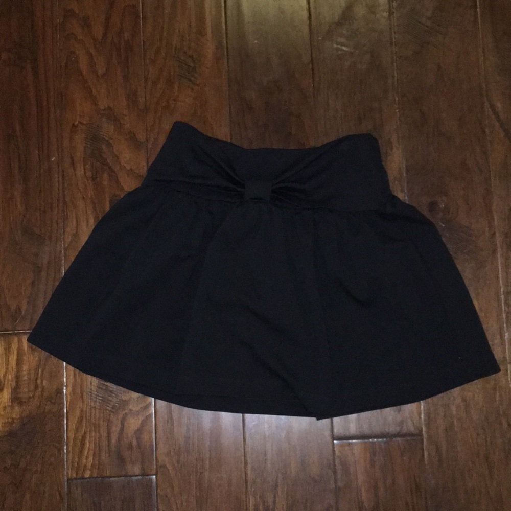 Black Kate Spade skirt, with a bow on the front